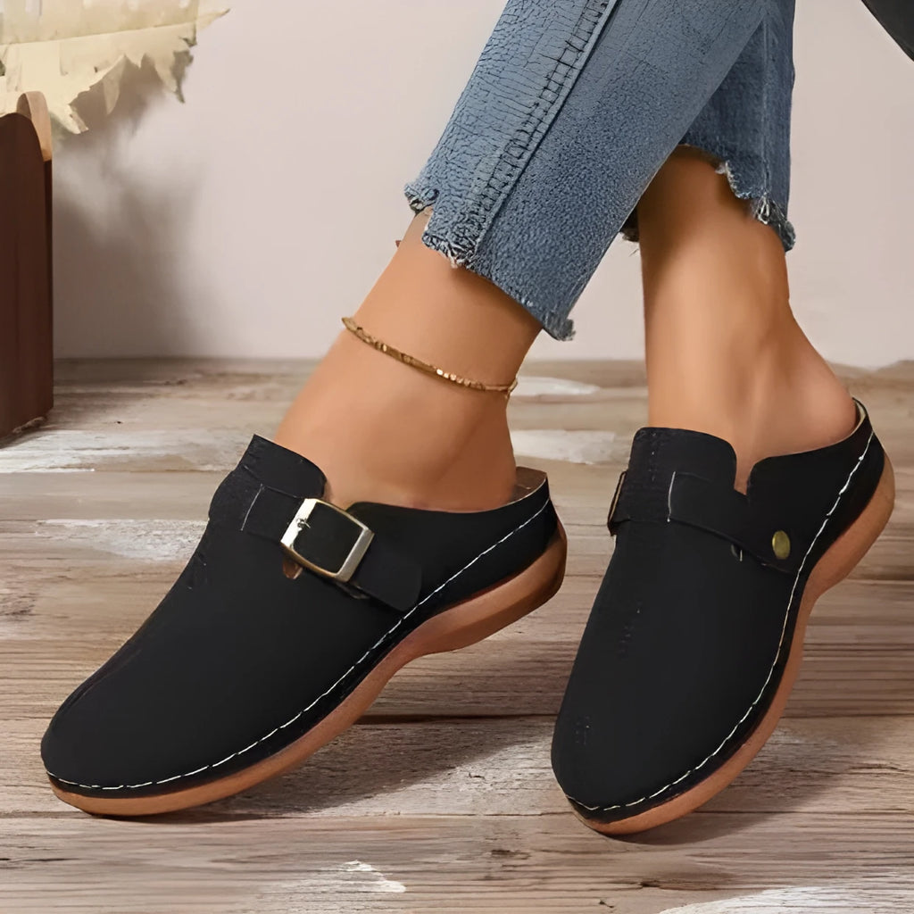 Women's casual wedge slippers in black with closed toe and rubber sole