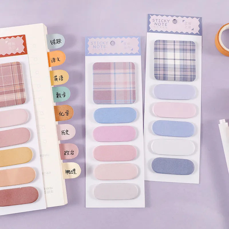 Colourful memo pad with plaid design sticky notes showing six different patterns