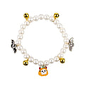 Halloween cat collar with simulated pearls and pumpkin charms in purple ghost, skull, and smiling designs