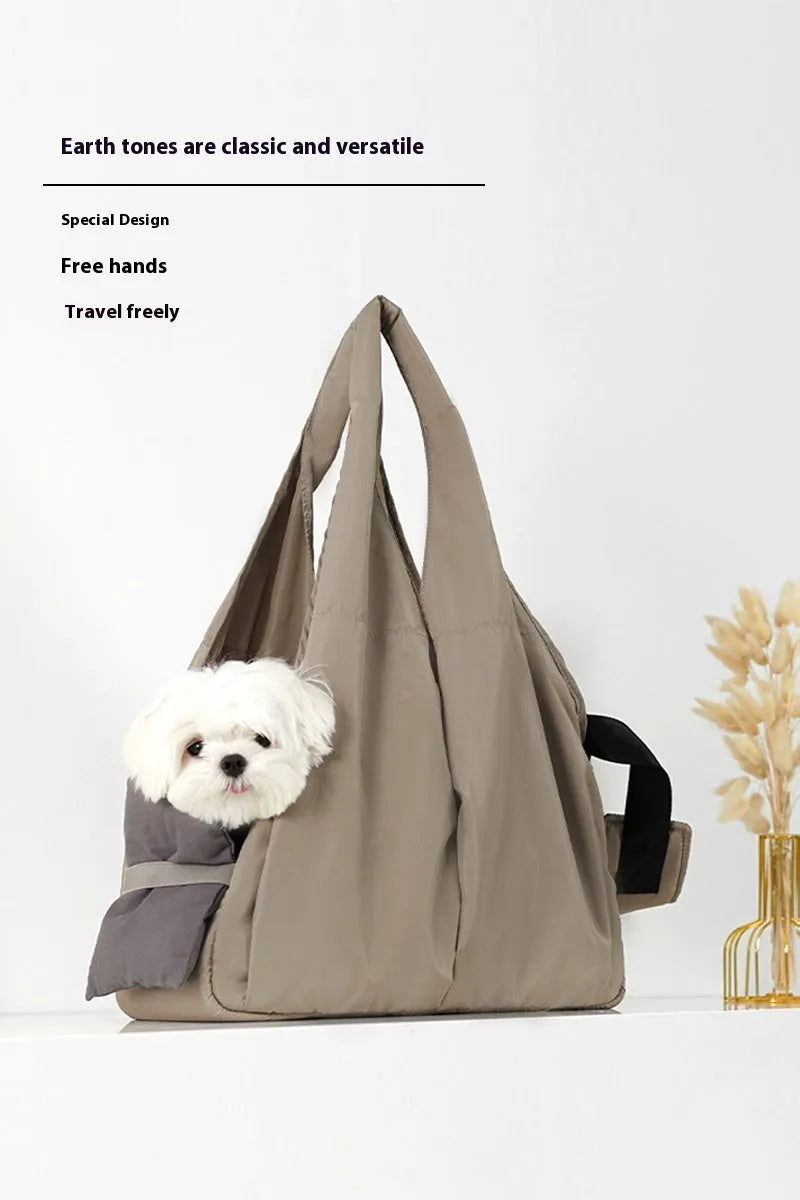 Apricot cloth pet carrier handbag showing portable design for pet transport