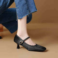Women's black square toe stiletto ankle-strap shoe with horse hair upper and buckle closure