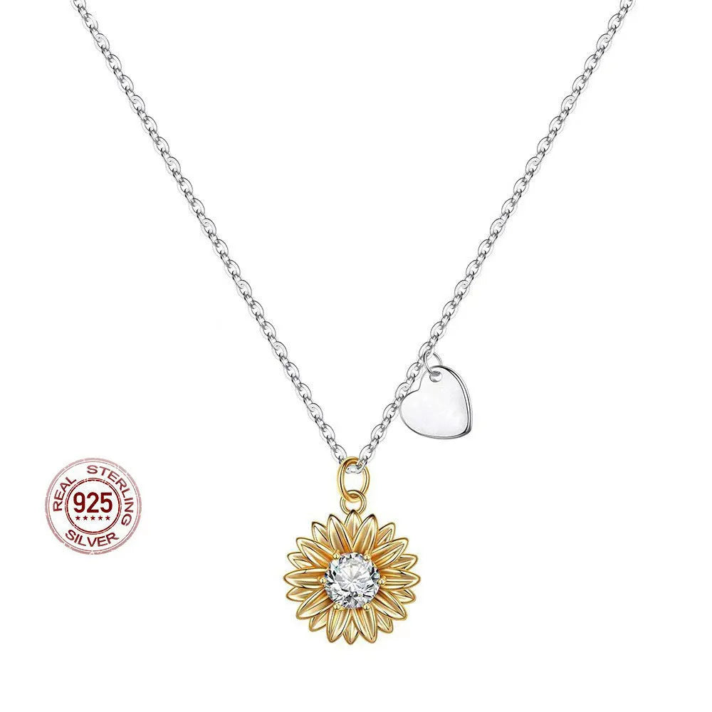 925 silver adjustable sunflower necklace with geometric daisy pendant on a cross chain.