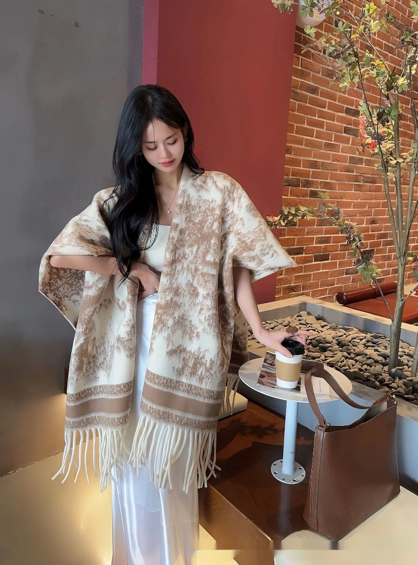 Women's polyester scarf cape with tassel trim in multiple colour options
