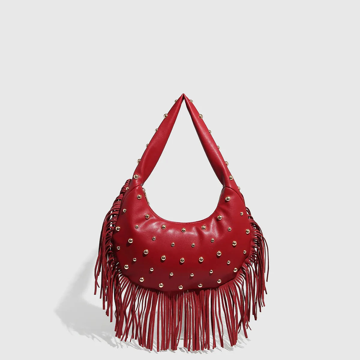 Retro style black shoulder handbag with a tassel decoration, shown with interior mobile phone pocket.