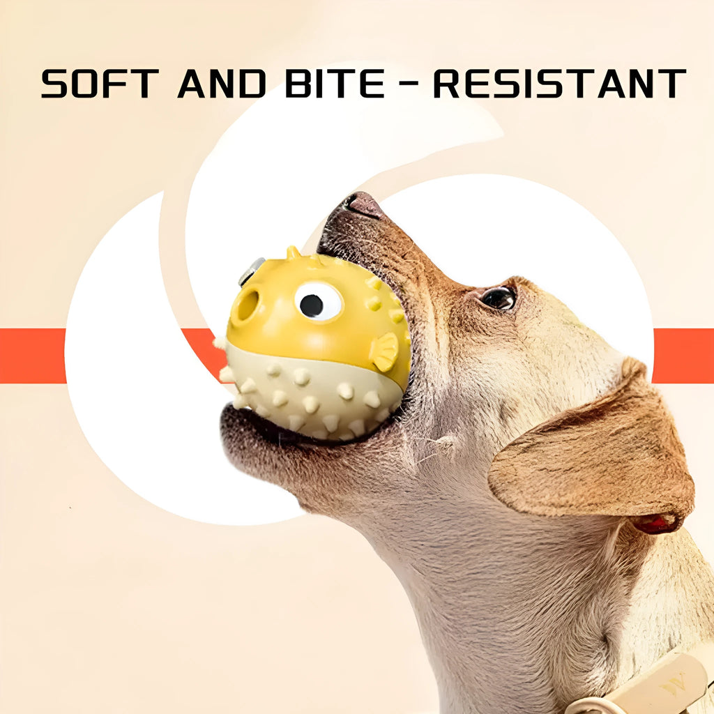 Yellow vinyl fish-shaped dog chew toy with textured surface for dental care