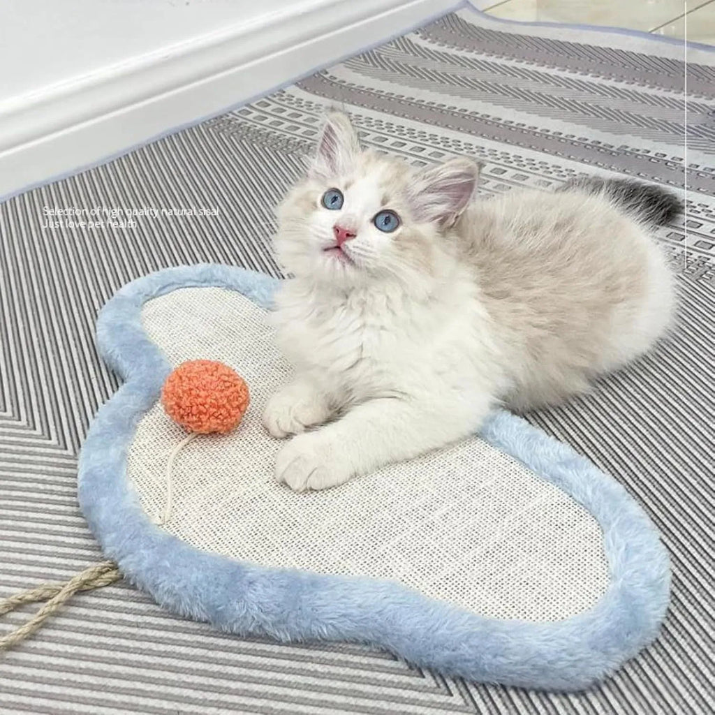 White wall-mounted cat scratching mat with a cartoon sleeping cat design, made from natural sisal.