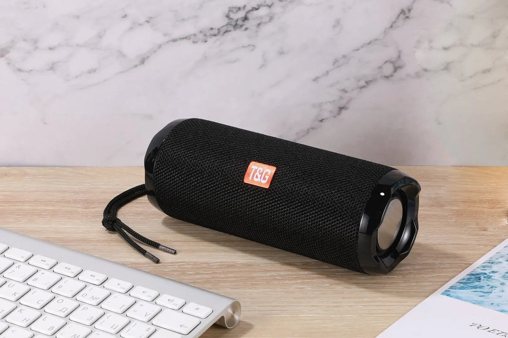 Portable fabric Bluetooth speaker with card holder in multiple colour options showing dimensions 182 x 73.5 x 69.2 mm
