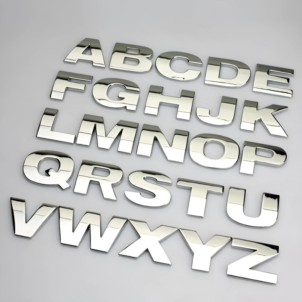 Zinc alloy 3D car bumper stickers showing individual metal letters approximately 2.5cm tall in black and silver finishes