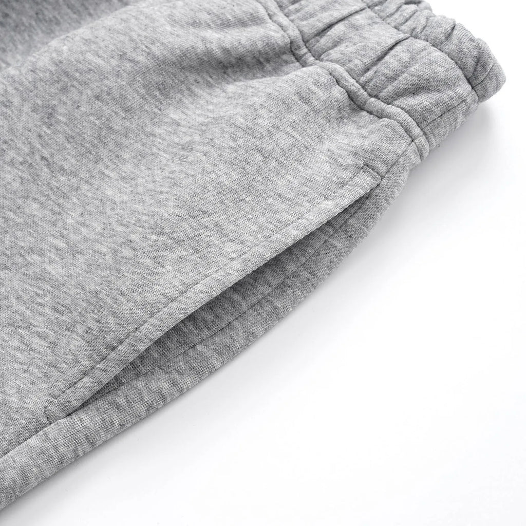 Men's straight-leg cotton casual trousers in black or grey with mid waist and loose fit