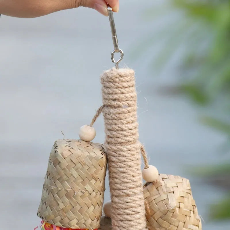 Wood and sisal parrot toy with colourful shredded paper centre for biting and foraging.