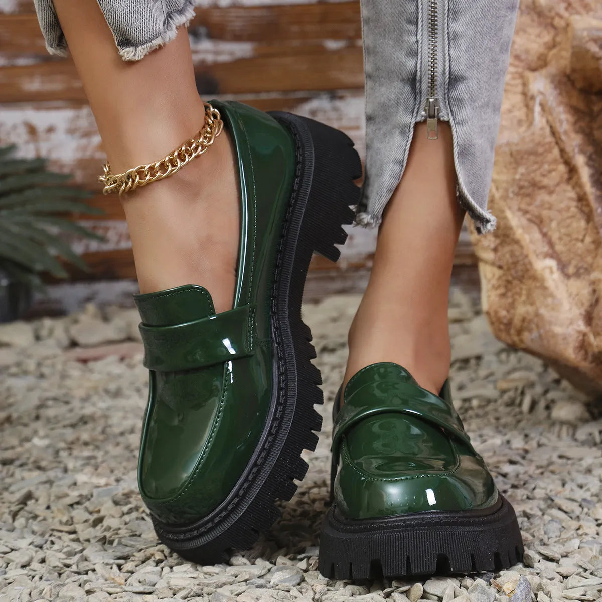 Women's black slip-on loafers with chunky platform heel and solid colour design