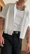 Men's white short sleeve polyester shirt with regular fit and cropped length design