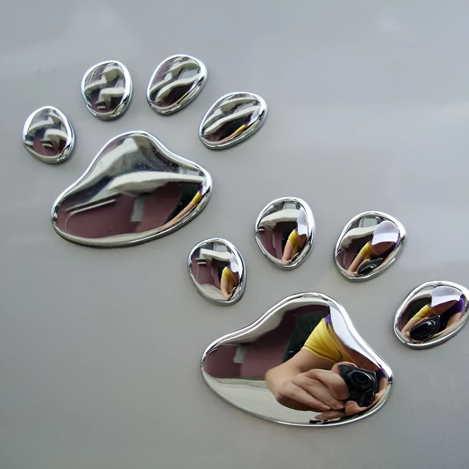 PVC car bumper sticker with hand-shaped brush dog footprint design in four colour options
