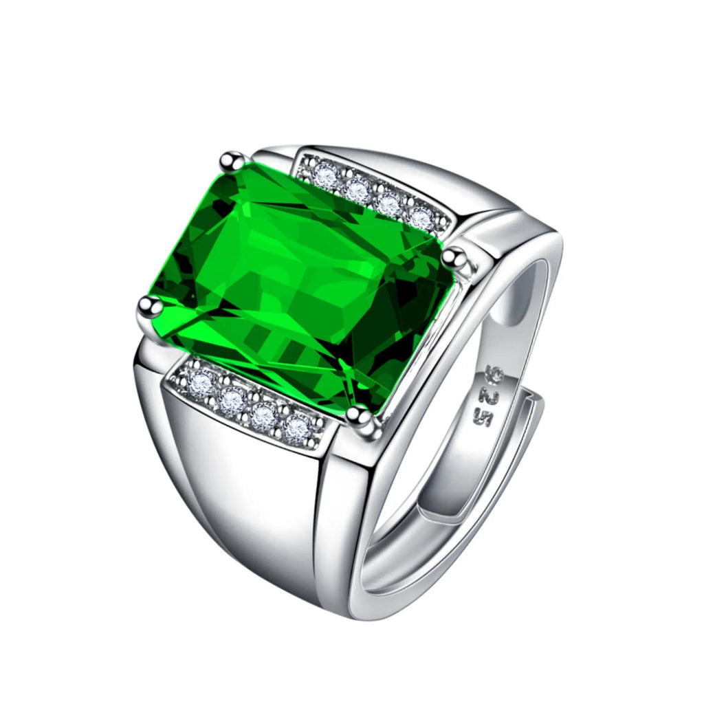 Adjustable open geometric ring with a coloured rhinestone on a copper band.