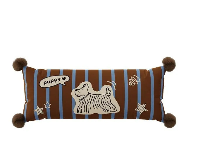 Blue cartoon animal printed cushion on a grey sofa showing removable cover.