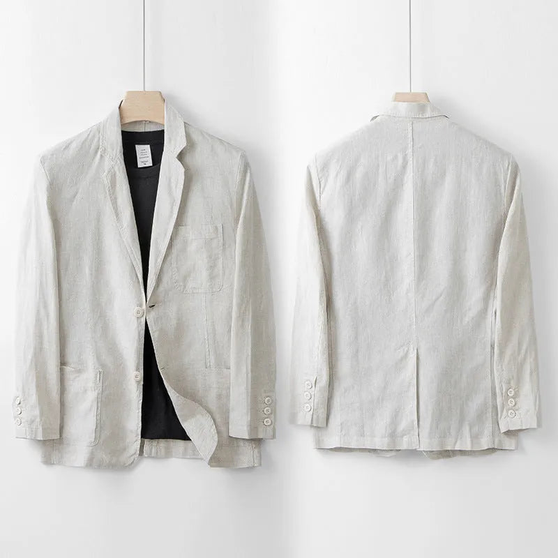 Men's loose fit linen suit jacket in a solid colour on a hanger, showing casual long sleeve design.