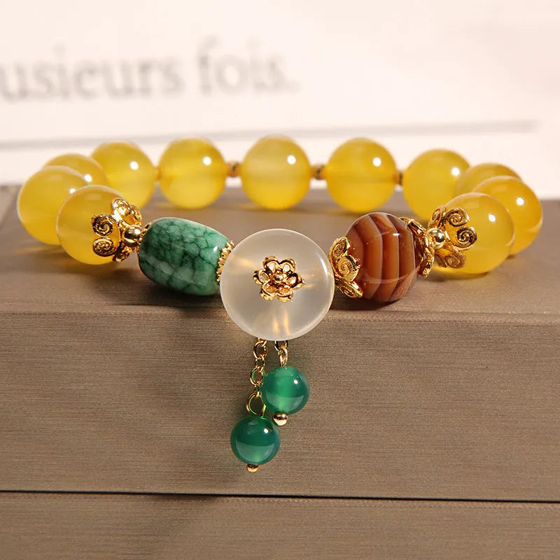 Women's yellow agate and crystal bracelet on gold silk thread in khaki colour
