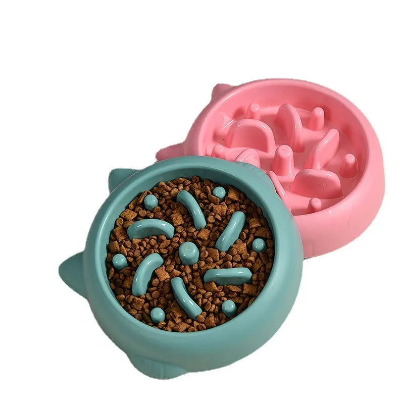 Green pet slow feeder bowl with bone-shaped raised ridges