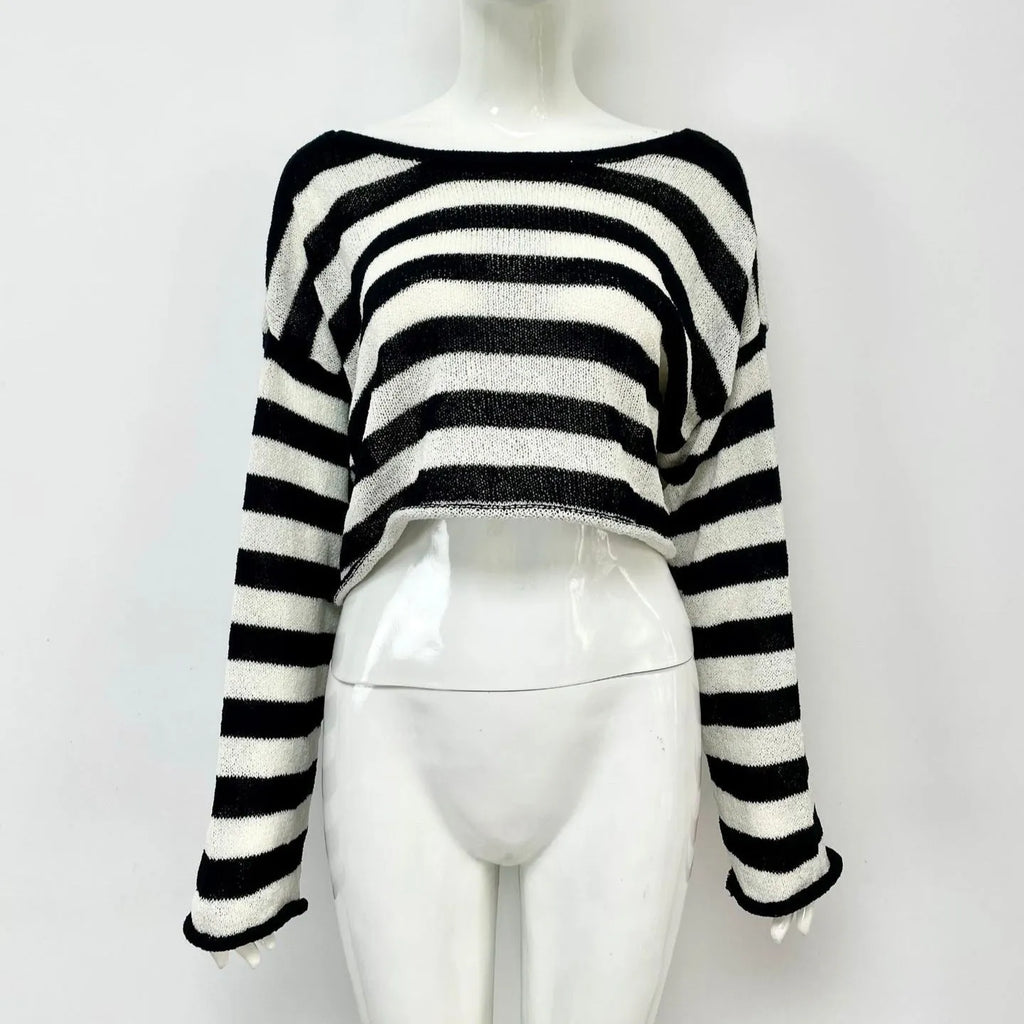 Striped long-sleeved cotton sweater with an exposed navel design on a model