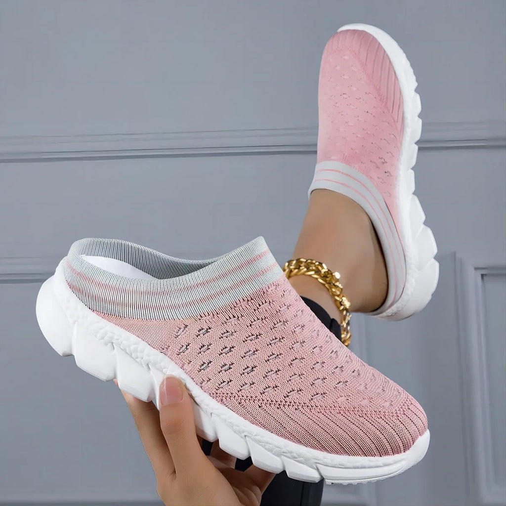 Women's black Flyknit semi slippers with hollowed-out sewing line detail and viscose sole