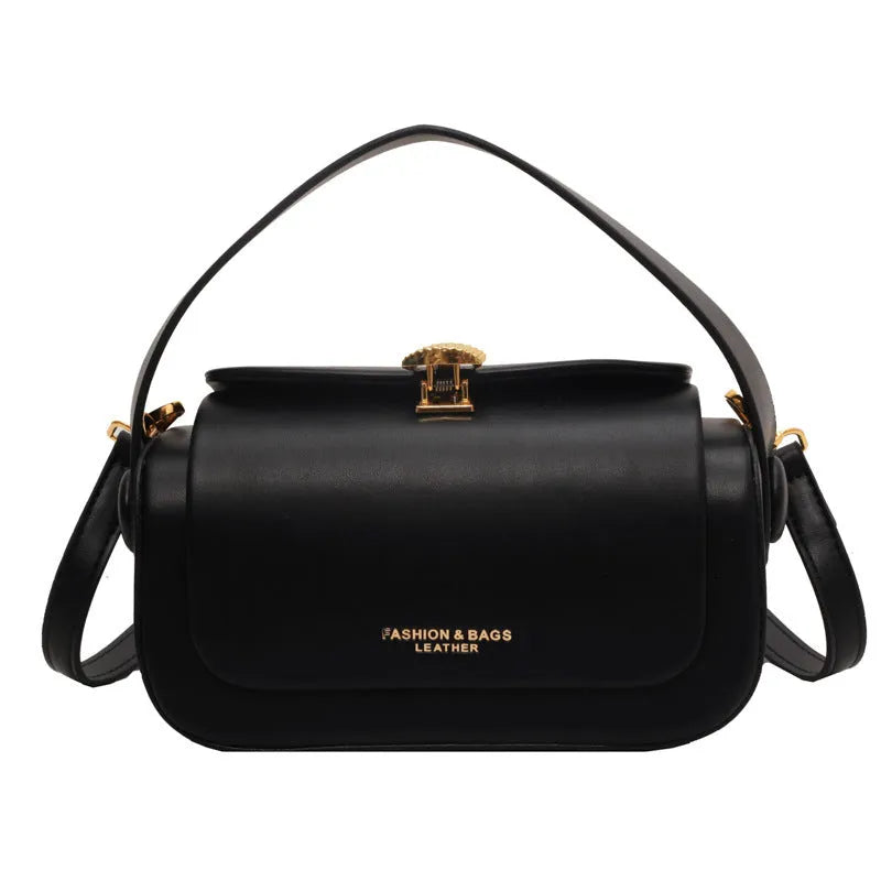 Women's personalised PU leather shoulder messenger bag in beige with letter detailing and stitching.
