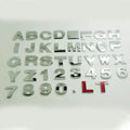 Zinc alloy 3D car bumper stickers showing individual metal letters approximately 2.5cm tall in black and silver finishes