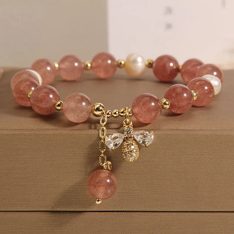 Freshwater pearl and strawberry quartz bracelet with zircon flower charms