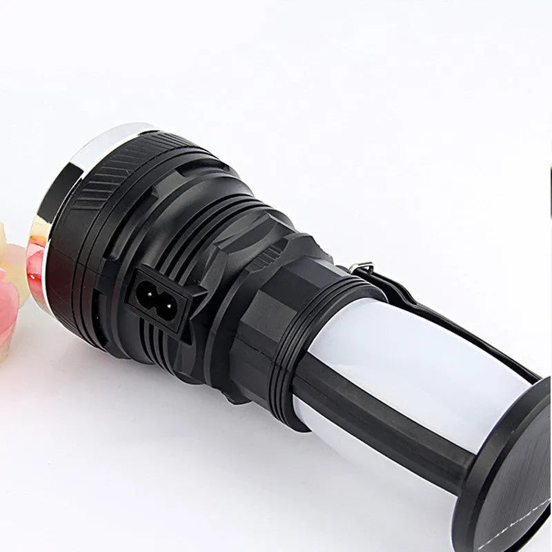 Black solar charging LED emergency flashlight with USB outlet for camping and outdoor use
