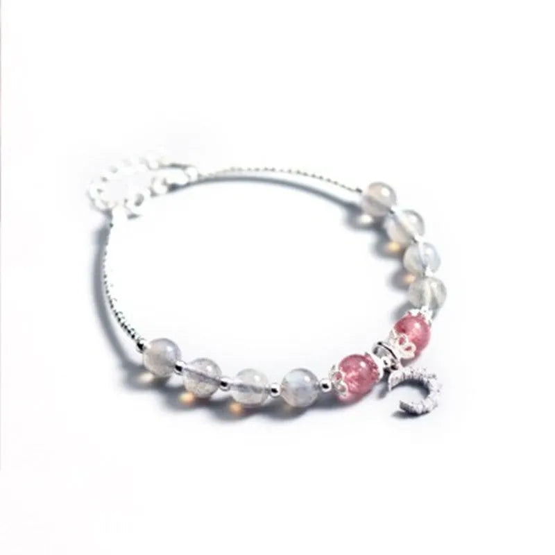 Natural moonstone adjustable bracelet with 6mm gemstone on wrist showing extension chain