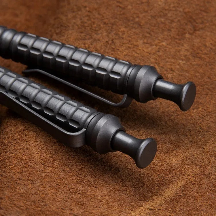 Titanium alloy tactical pen with push-action mechanism in gunmetal grey and 0.5mm nib