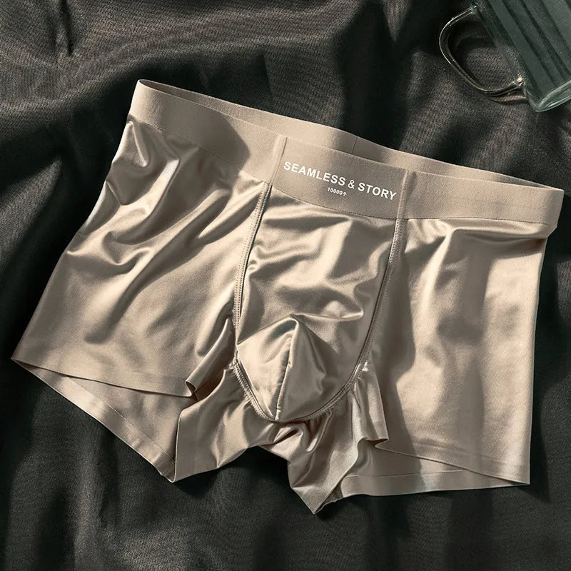 Men's light gray Ice Silk mid-waist underwear briefs laid flat.