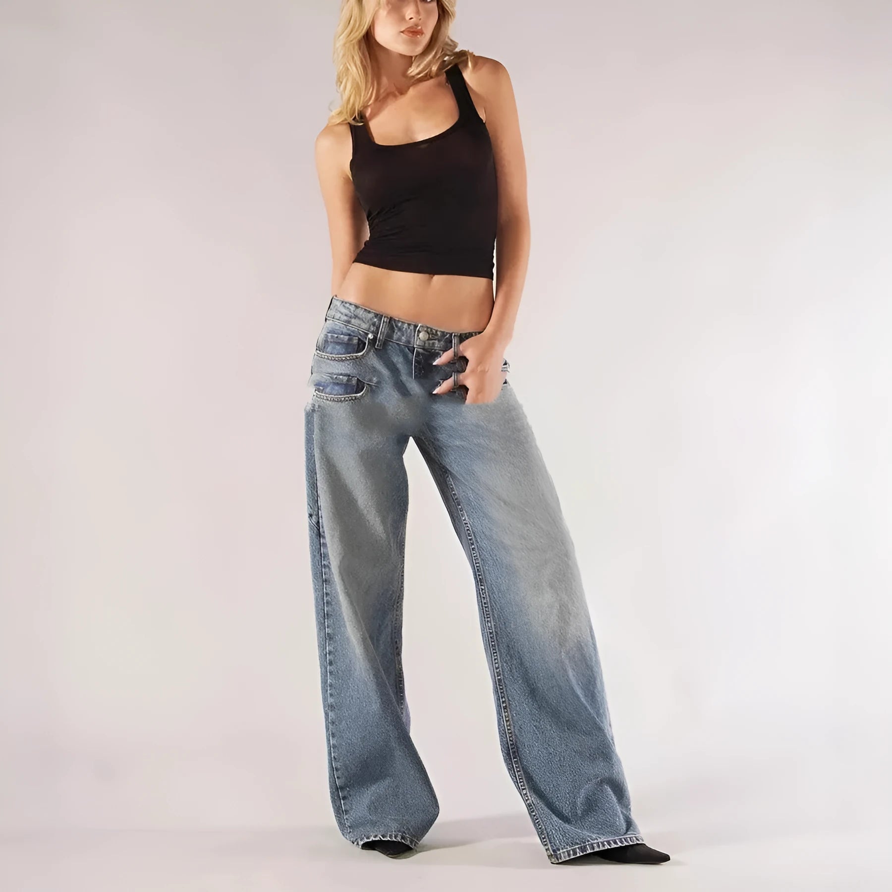Women's blue cotton wide-leg mop trousers with low waist and splicing detail laid flat.