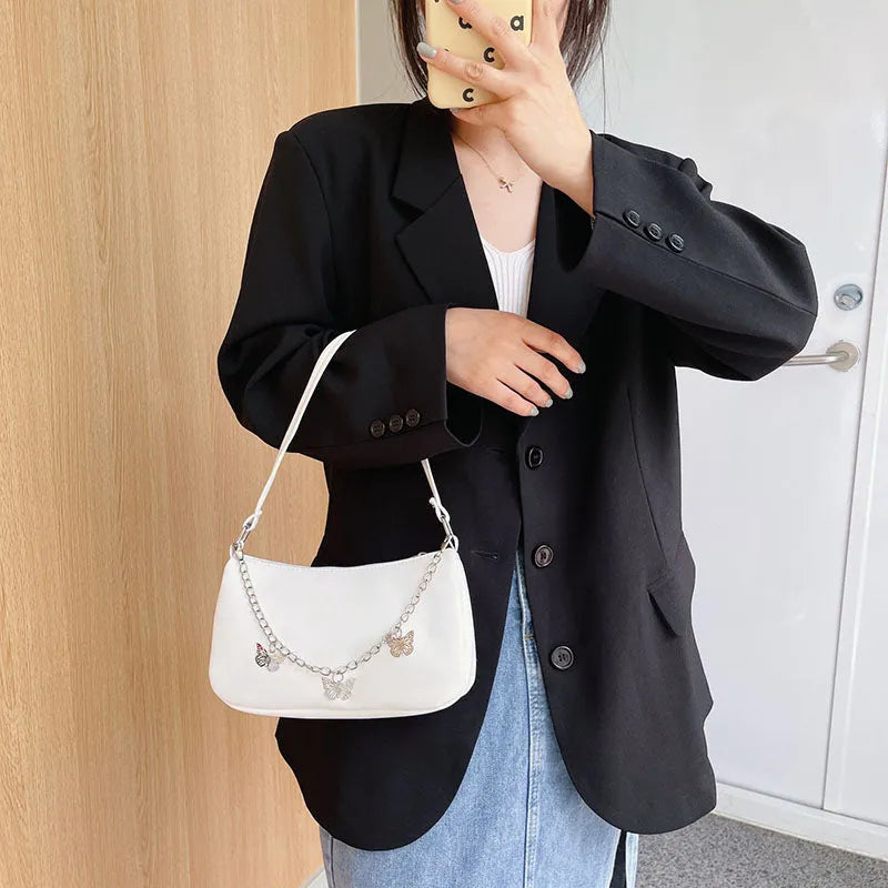Butterfly chain underarm crossbody bag in horizontal square shape with three-dimensional pocket