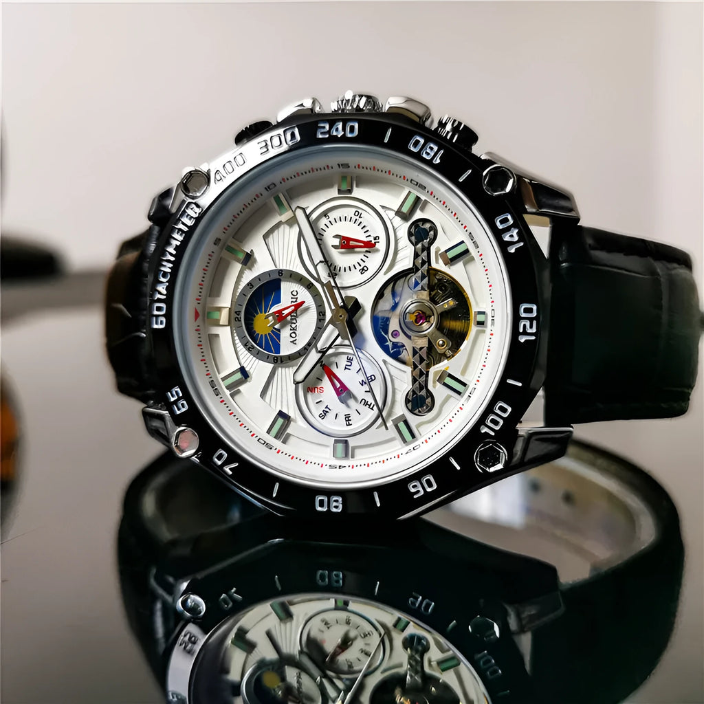 Men's automatic mechanical watch with silver case and black dial showing 12mm thickness