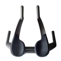Black carbon fibre TT bicycle handlebars showing angled extensions and clamp area.