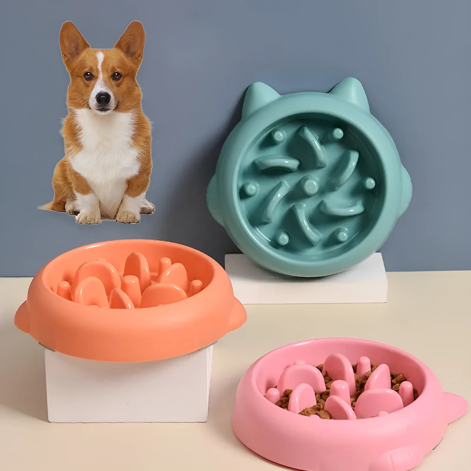 Green pet slow feeder bowl with bone-shaped raised ridges
