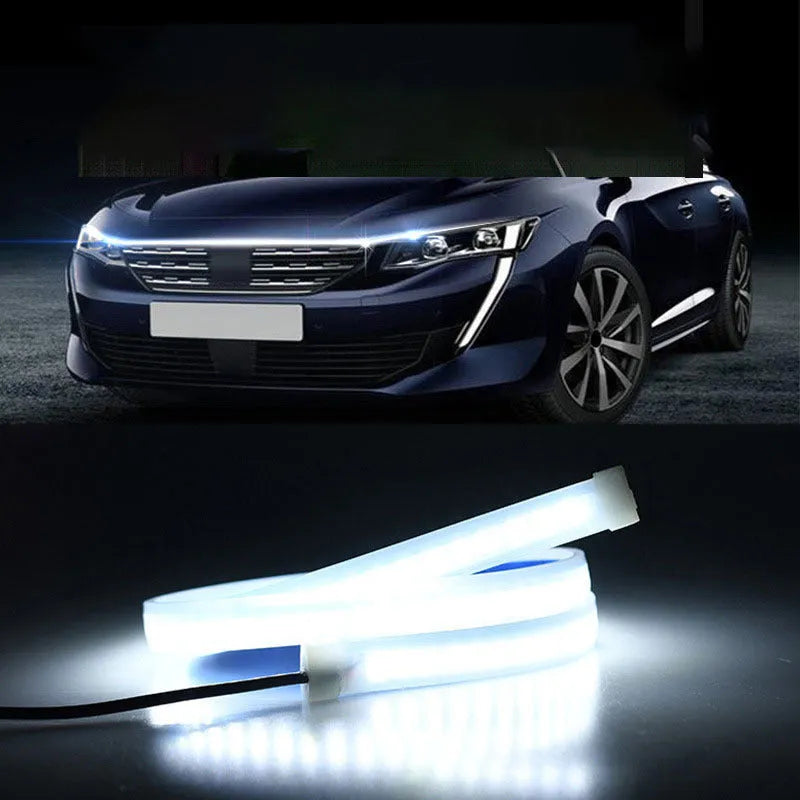 Close-up of a flexible white PVC LED light strip for car engine bay or underbody installation.