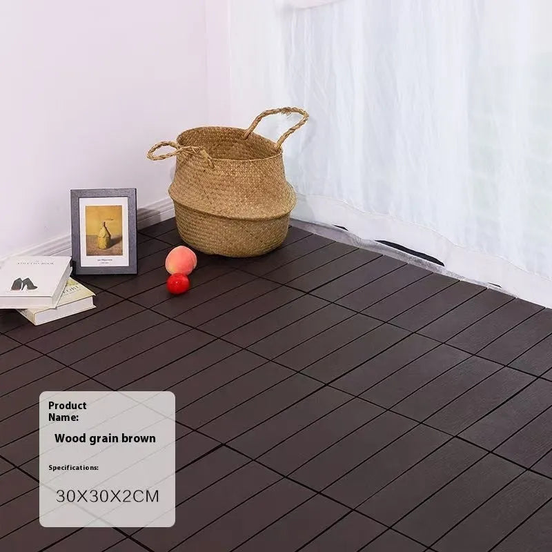 Wood grain plastic floor tiles in brown, grey and orange colours showing non-slip texture