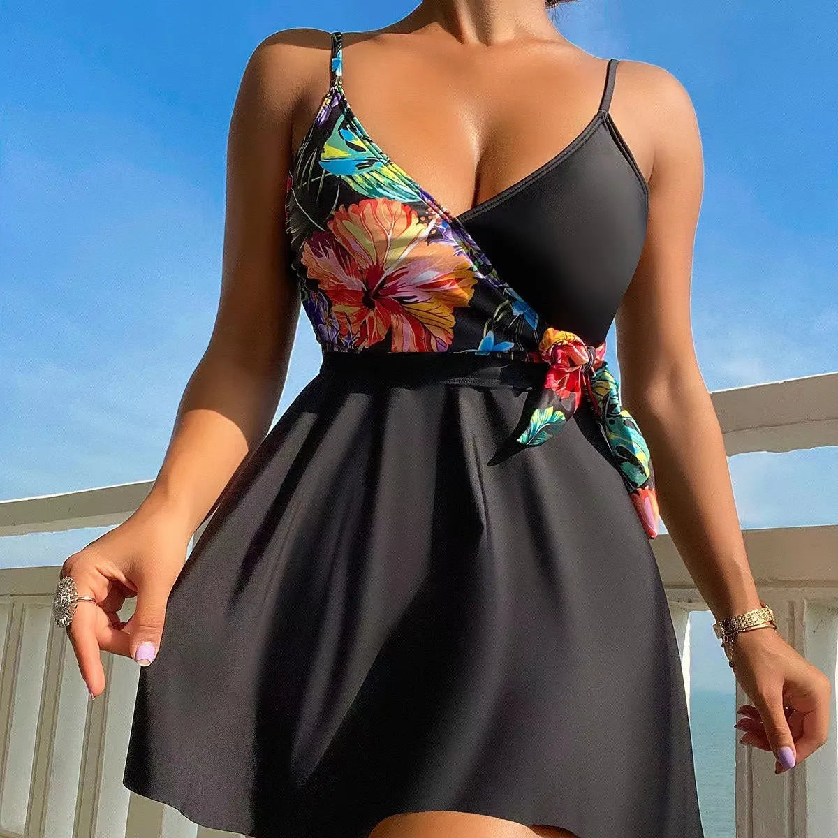 Black women's high waist briefs with a printed split bikini design for sports and swimming.