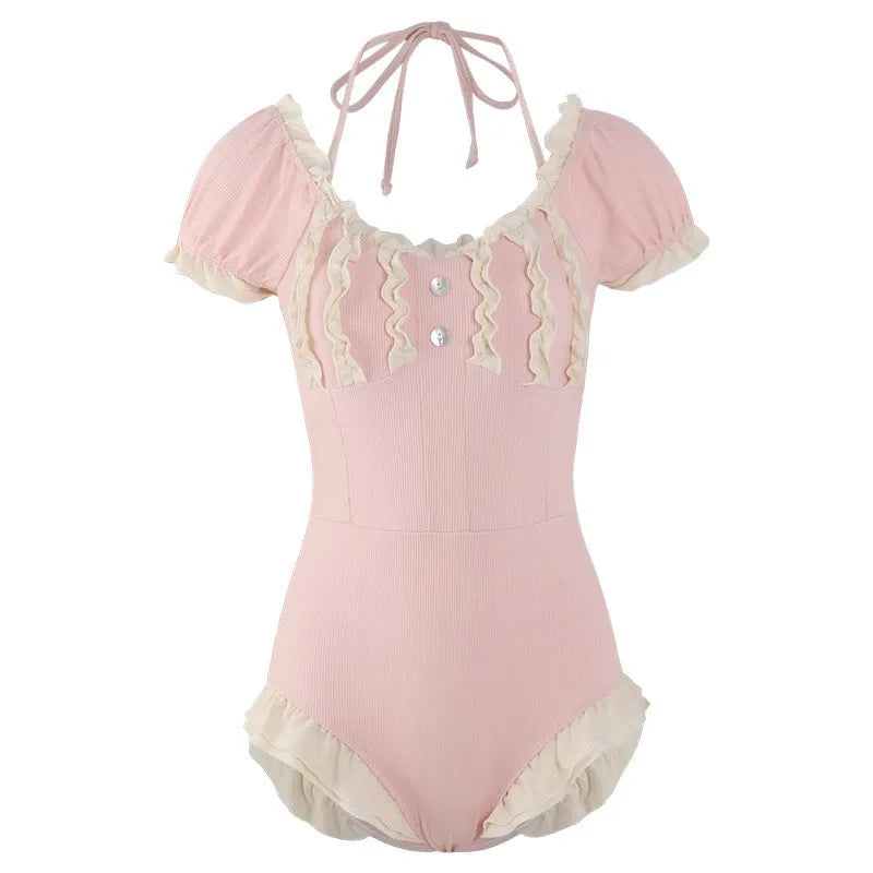 Pink conservative one-piece swimsuit with Siamese-themed detailing for women in nylon fabric