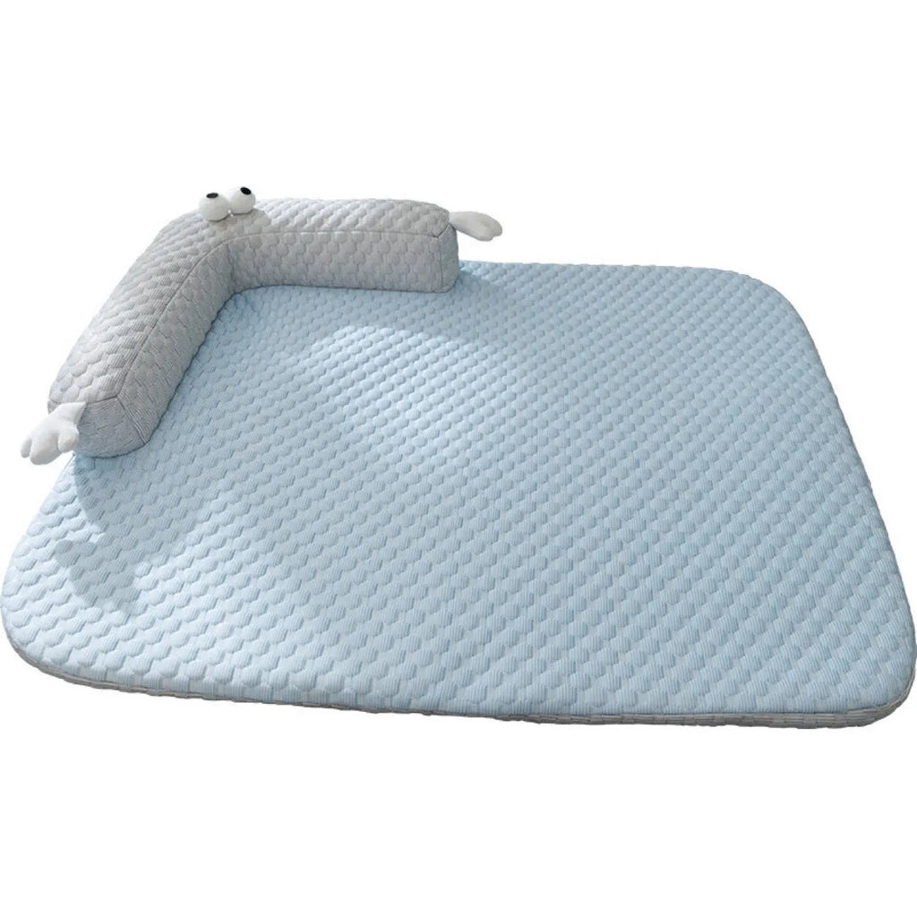 Blue pet cooling bed with large-eye monster design on non-slip polyester mat for dogs and cats