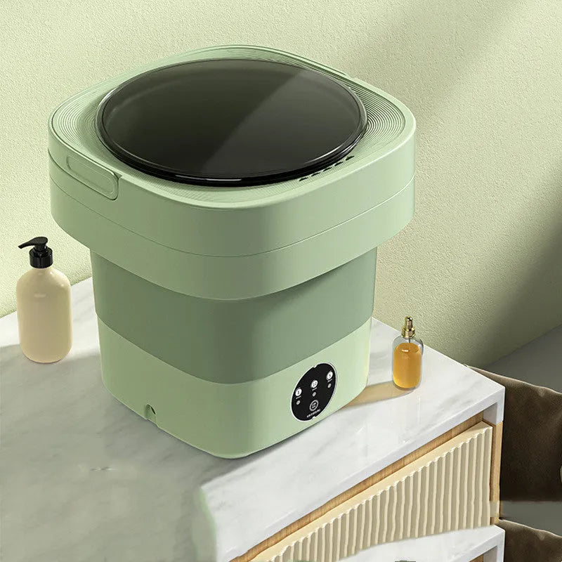 Mini foldable washing machine in green with blue light sterilisation and drain basket