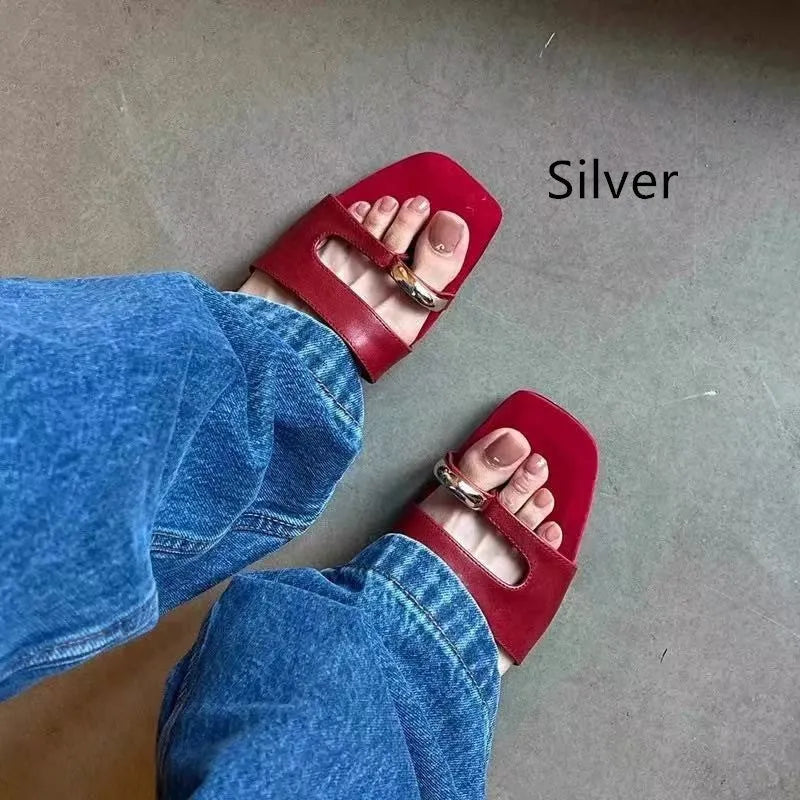 Women's plus size square toe outdoor slippers in leather with a rubber sole.