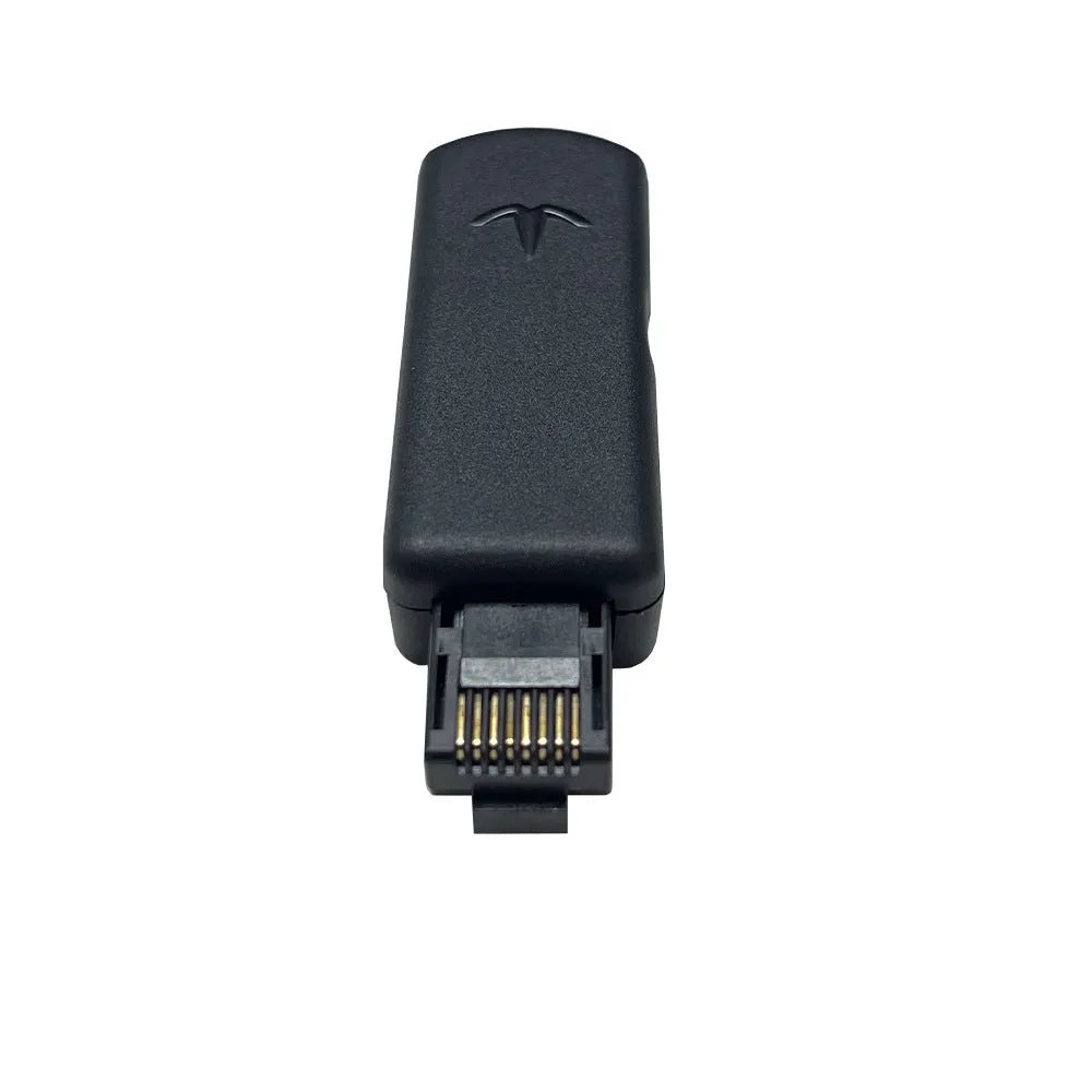 Black JB Tool USB host adapter with aluminum alloy body next to data cable and manual.