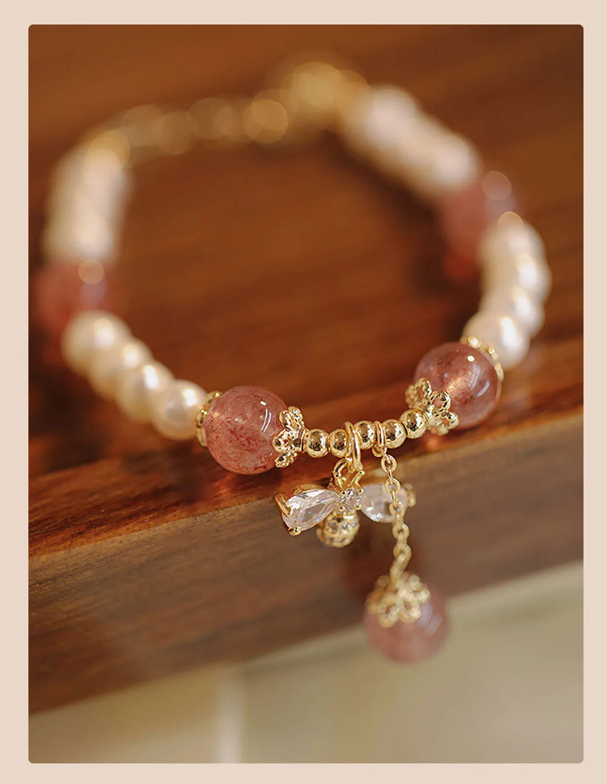 Strawberry quartz crystal bracelet with bow detail and stringed pearls for women