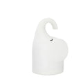 DOMI Elephant-shaped silicone night light with soft white glow on a bedside table