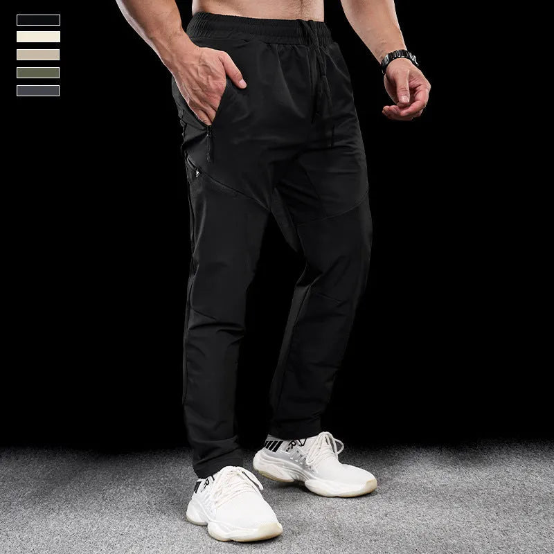Men's waterproof quick-dry nylon exercise trousers in Army Green colour with mid waist design