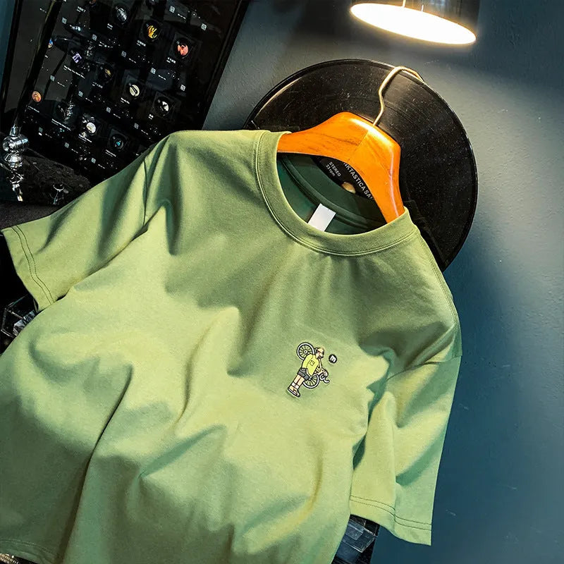 Green men's loose fit T-shirt with printed design and short sleeves for sports wear