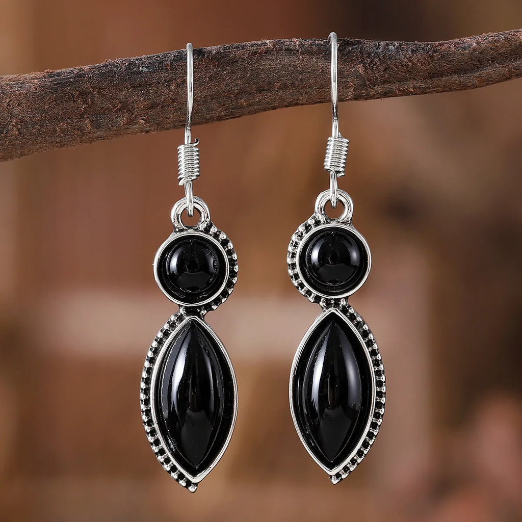 Vintage geometric pendant earrings with black and purple electroplated finish on zinc alloy.