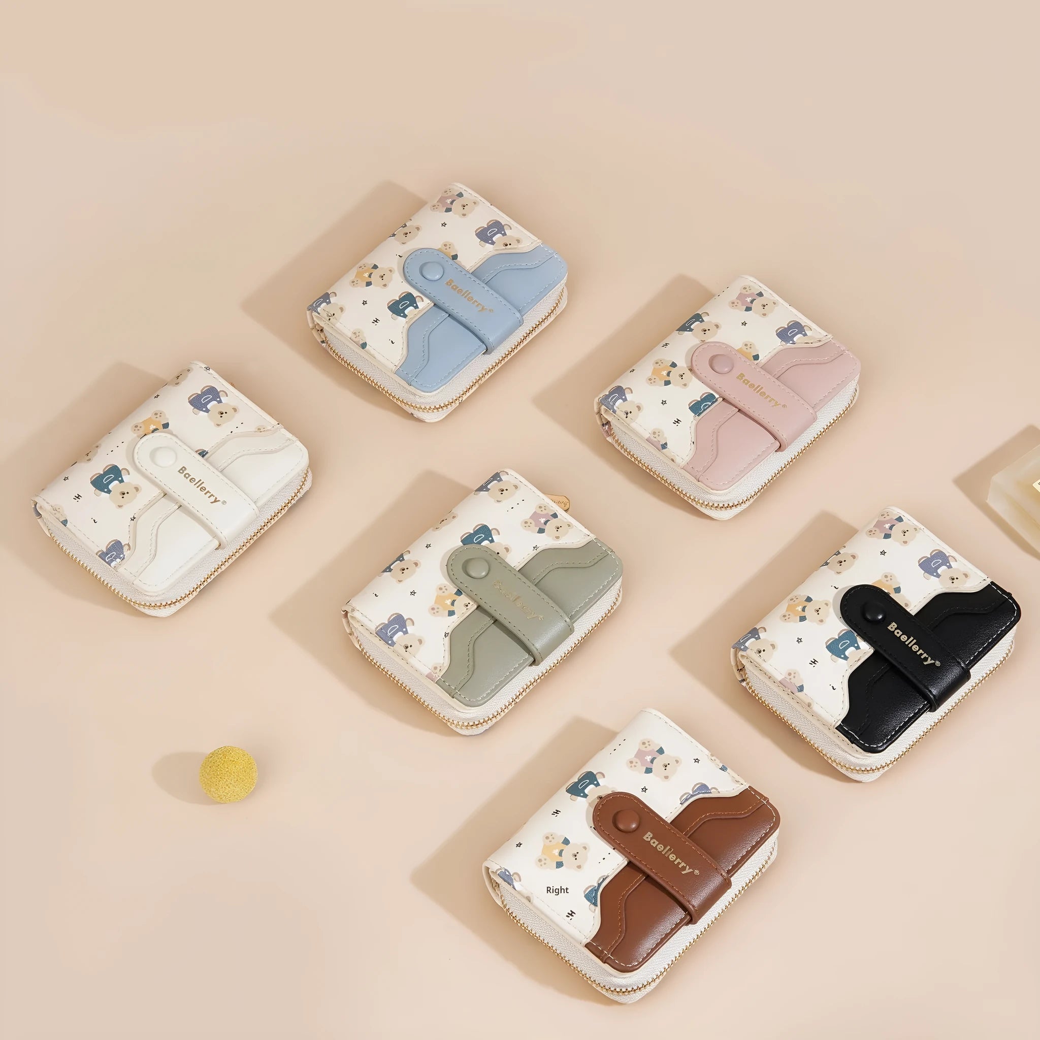 Cartoon printed women's wallet in beige with visible sewing thread details and short horizontal shape